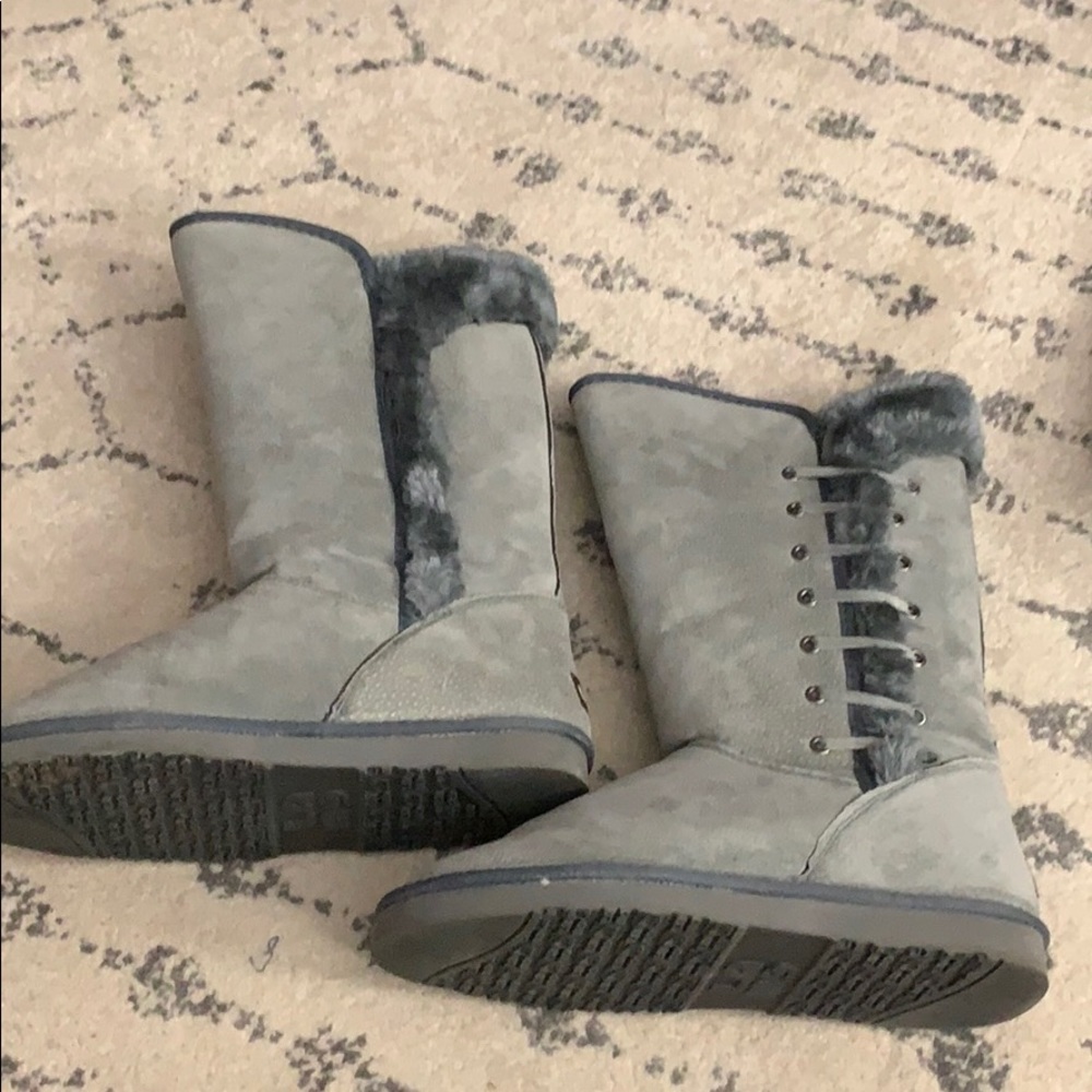 Gray Lamo boots with lace up and fur side details